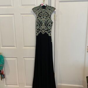 Gorgeous beaded evening or prom gown. Never worn. Tags still on.